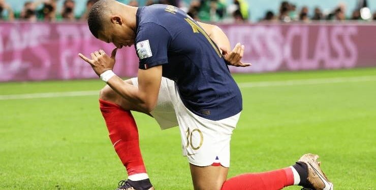 Kylian Mbappe performs his iconic celebration 