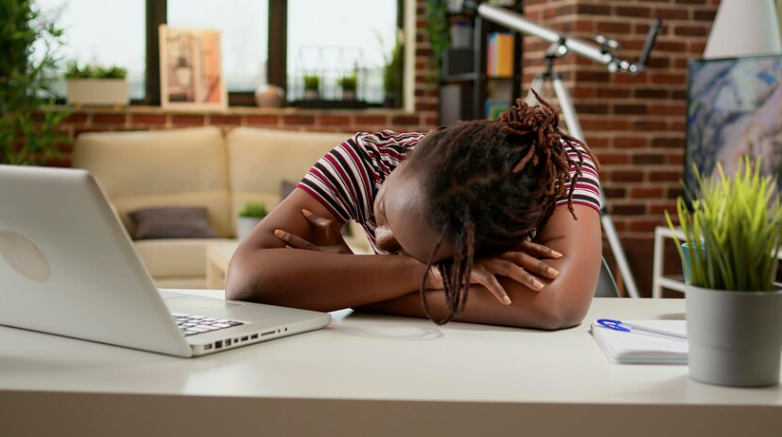 A lady sleeping at work 