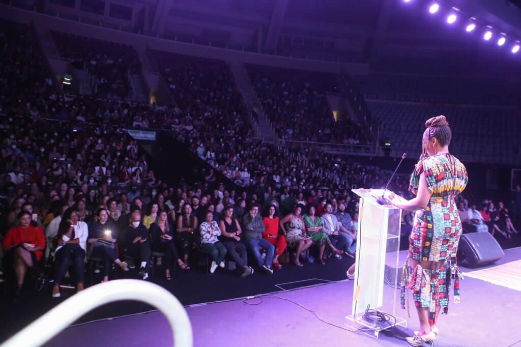 A lady dressing a crowd