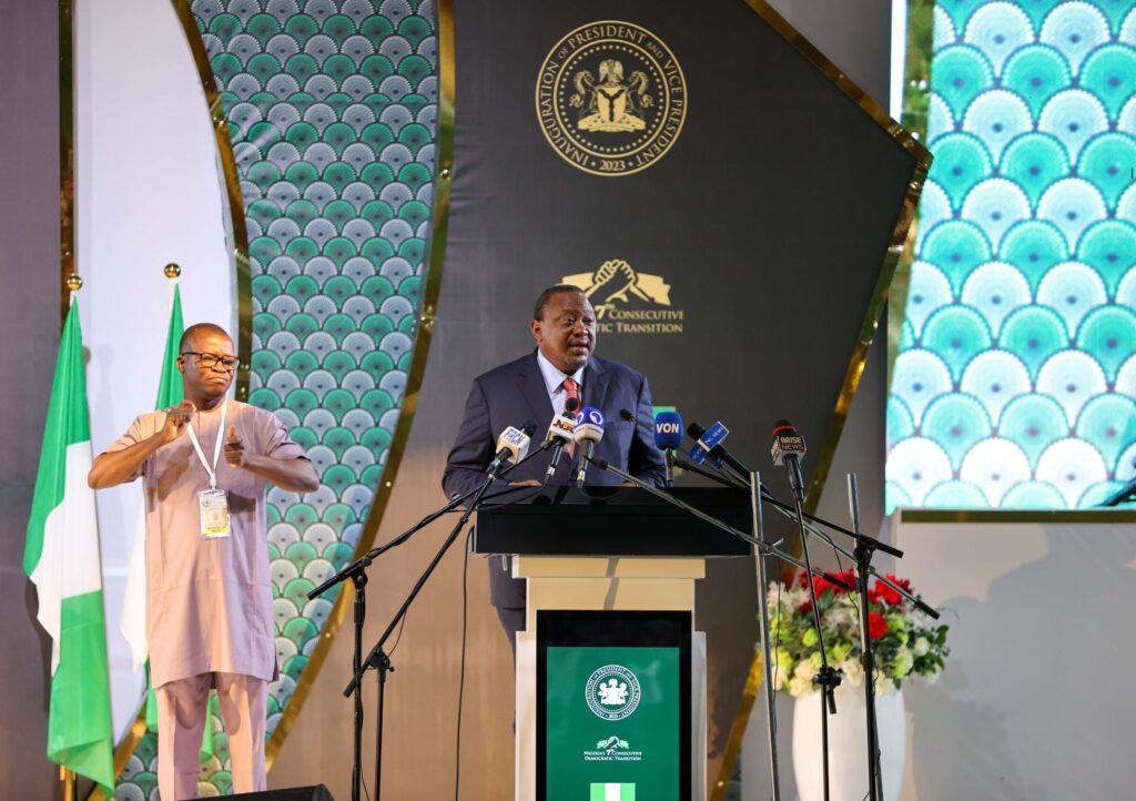 Former Kenyan President addressing people 